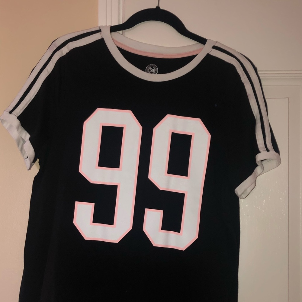 Black top with pink and white numbers